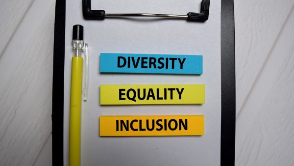 Image of a clipboard with the words Diversity, Equality, Inclusion on it.